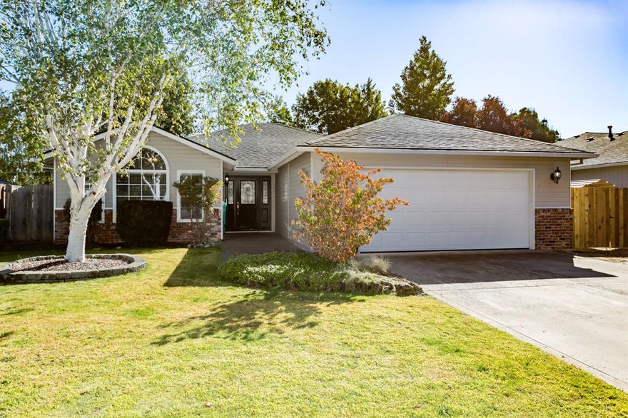 Great single-level floor plan in desirable SW Medford neighborhood. Exterior brick accents and covered front porch with attractive leaded glass entry door and sidelights. Hardwood floor in entry. Vaulted living room with large picture windows and radius transom window. Separate family room is vaulted with French doors to back patio. Kitchen offers tile counters, eating bar, stainless steel appliances including smooth cooktop range/oven, built-in microwave hood and dishwasher and hardwood flooring. Master suite has rim ceiling detail, walk-in closet, double sink vanity, jetted corner tub and walk-in shower. Built-in linen storage in hall. Indoor laundry room with extra cabinet storage, folding counter and washer/dryer included. Good-sized fenced back yard is attractive and shaded. Fire pit off patio. Attached 2 car garage plus RV parking. Brand new roof installed September 2016!