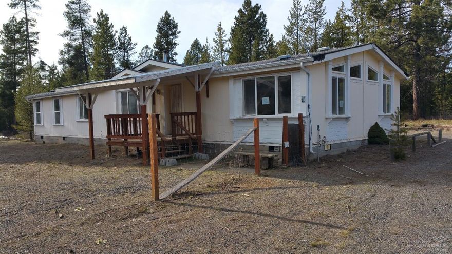 There is so much potential here! spacious 3 bedroom 2 bath home offers separate living room w/media cabinet, family room and a formal dining room w/built-in hutch. Large galley kitchen with breakfast bar and separate utility room. Master bath w/dual vanities, separate soaking tub and shower. The oversized detached two car garage has room for vehicles and toys alike. This home has had previous water damage from roof leaks and will not qualify for some types of financing.