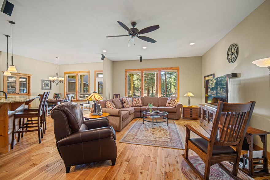 Extraordinary home in Ponderosa Pines! Outstanding high quality single level home on 1.15 (+/-) acres that adjoins and overlooks the National Forest. Custom knotty alder cabinets with soft close drawers, vaulted ceilings, wood wrapped windows and doors, high end appliances, hardwood floors, heat pump , covered rear deck, and an unbelievable framed 1992 s.f. shop with a full bath, office, one heated bay plus a 722 s.f. utility building. Both the home and shop have 200 amp services. This home is also about a lot of things you don't see like R50 insulation in the ceilings, 1 1/8'' plywood subfloor (no OSB), 75 gallon hot water heater and more. With the outdoors at your back door, you can hike, cross country ski or snowmobile from your backyard!

Ideally located with easy access to La Pine, the Deschutes River, the High Lakes and Mt. Bachelor, this home is the complete package!