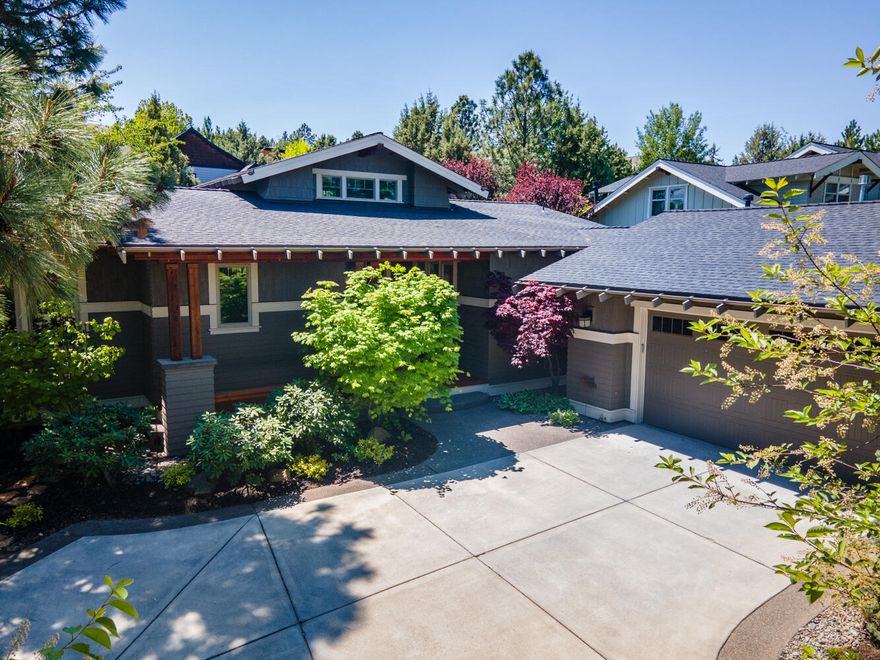 This single level, Best in Show award winning residence is on the market for the first time. Perfect Awbrey Park location, facing park and trail access. Residence wraps around fully fenced private courtyard and gardens. Side yard encompasses Bocci Ball court and dog run. Chefs kitchen offers large island with wood inlay and prep sink. High end cabinetry with back splash, windows, top of the line appliances, positioned for entertaining and filled with natural light. Kitchen, great room, primary suite and guest rooms offer views and access to courtyard. Private primary suite with entry foyer, large bath, radiant heat and generous closets. Oversized double garage complete with workshop space, window, door to outside and large utility sink. Mudroom with bench and storage. Laundry room has ample storage, sink and window overlooking the Bocce Ball court. Crown moulding, high ceilings, hickory flooring. Winner of Best in Show, Best Kitchen, Best Primary Suite, Best overall Design and more.