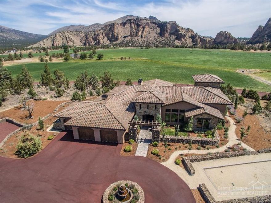 Overlooking the Ranch's Pioneer Orchard, the Crooked River and Smith Rock, this single-level, 100% Energy Efficient ICF built Tuscan-style home features one master suite and two guest suites, bonus room, Viking appliances, Butler area with wine storage/refrigerator, radiant floor heat throughout, custom cabinets, covered outdoor kitchen, Bocce court and shared ownership of 1700 acres of Ranch at the Canyons. The Ranch has 4 canyons, vineyard, trout-filled lakes and 550 acre wildlife preserve. Open weekends!