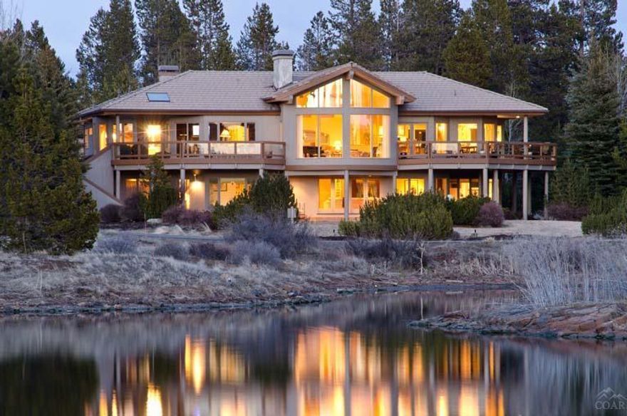 Warm and inviting, this Northwest resort design is the essence of the Central Oregon lifestyle and offers lake and mountain views on the Woodlands Golf Course. Grand entrance & interior design with a WOW factor. Open great room with exposed beams, tongue and groove wood ceiling and huge picture windows bring the outdoor scenery to life. Gourmet kitchen, artful details, 4 bdrm suites, 4 fireplaces, Cherry wood office, sports bar & gathering room, 4 car garage. Ask for list of other amenities and features.