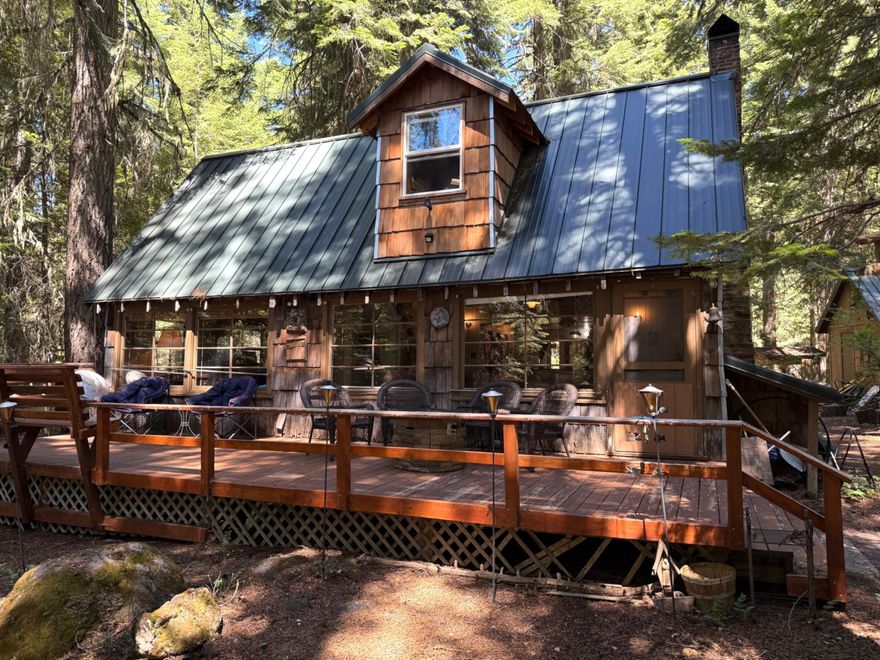 Fish Lake Vacation Cabin For Sale. Attention outdoor enthusiasts, year round adventure awaits! This cabin comes fully furnished & includes a small dock, & shed. It has a septic system & potable water system. The land is owned by the Forest Service, requiring a yearly lease fee $2622 Roughly 35 miles Northeast of Medford, this Lake cabin is an ideal getaway. Tucked among towering evergreens, this charming cabin has a way of welcoming you from the moment you arrive. Unlike many cabins, this one offers an indoor bathroom w/ a septic system, a shower, sauna, a pellet stove & a furnace. The cabin has a roomy living area w/high ceilings of rough sawn lumber, open to the kitchen and ample windows facing the lake. Additionally, there is a large deck that extends the entire width of the cabin to further enjoy the idyllic scenery & distant lake view. Cabin is not easily visible from the Lake because of the massive conifers that surround it & keep it nice & cool. Cash only purchase.