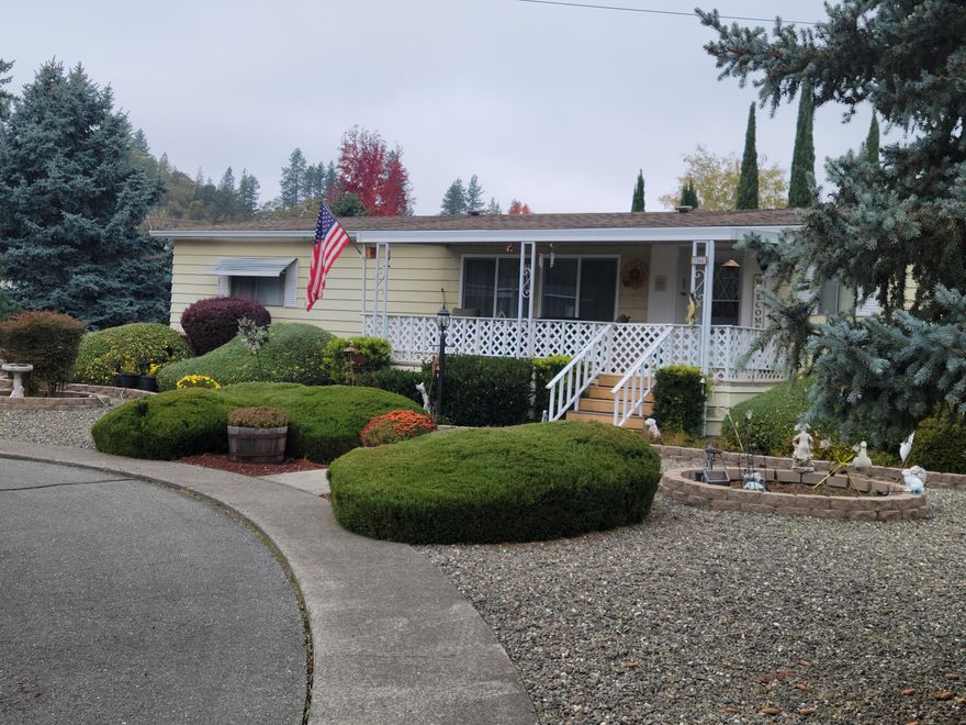 Here is an opportunity if you are looking for a GREAT deal on your next home purchase! Nestled at the end of a cul-de-sac, in a 55+ subdivision, this 3-bedroom, 2-bath home offers the ideal blend of comfort, convenience and privacy. Over the past 2 to 4 years, the owner has replaced the roof, heat pump and flooring in the living room, bedroom, dining room in addition to adding a 37' ramp under the carport for easy access to the home. Inside, 1848 square feet of living space separates the primary bedroom on one side from the 2 additional bedrooms on the other side. A covered patio is perfect to enjoy the mountain view and occasional wildlife. Don't miss this one! Bring your offer and let's make this happen!