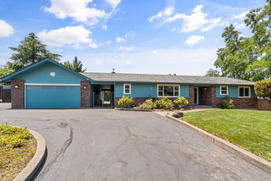 This beautifully updated East Medford home sits on a rare subdividable double lot—offering move-in comfort today and future potential tomorrow. Inside you'll find 3 bedrooms, 2.5 bathrooms, new luxury vinyl plank flooring, a fully remodeled kitchen with quartz countertops, new furnace, and both living and family rooms for flexible living. Step outside to enjoy the heated in-ground pool, or bring your hobbies to life in the oversized woodshop (21'x26').  attached to the detached garage. With a brand-new roof, new furnace, and an unbeatable location, this one is a rare find.