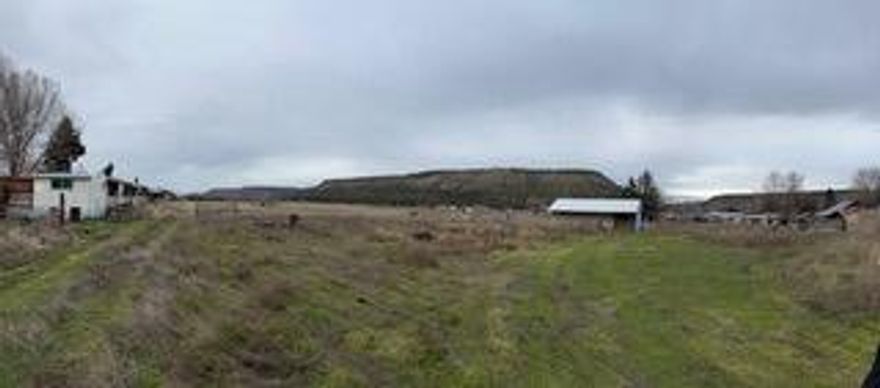 Attention investors, developers, and builders! Fix up the existing home or clear it and build the home of your dreams! Imagine sitting on your back porch and taking in the beautiful views of the Ochoco mountains and farmlands towards the back of the property. Or divide the lot and start work on your new investment project! Seller has initiated the process of dividing the lot into 3 parcels. Several outbuildings for added storage and/or small shop. This is a great opportunity to own 3.25 acres with a ton of potential set in a quiet neighborhood, surrounded by larger parcel properties and a comfortable country feel. Zoned SRM1. Property and home are being sold As Is. Don't miss out on the potential in this property! Call your favorite Realtor today for more details! Professional photos coming soon.