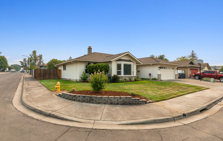 Impeccably maintained East Medford home on a quiet cul-de-sac.
The pride of ownership at this property is evident and makes the home warm and welcoming as soon you step in. The front living room boasts vaulted ceilings and a north-facing bay window, so the room feels open and comfortable from morning to evening. The kitchen, dining room, and family room all flow together, with a floor-to-ceiling brick feature fireplace creating an ideal space for gathering with friends and family. A large bonus room off the kitchen is currently set up as a fourth bedroom, but would be perfect for a homeschooling or office space. The three other large bedrooms have walk-in closets, with an on-suite bathroom for the primary bedroom and an oversized guest bathroom with dual vanity. The exterior is as inviting as the interior, with an 8' fence separating the in-ground pool area from the back neighbor, a low-maintenance yard, and ≈35' RV parking with easy access and its own gate from the side road.
