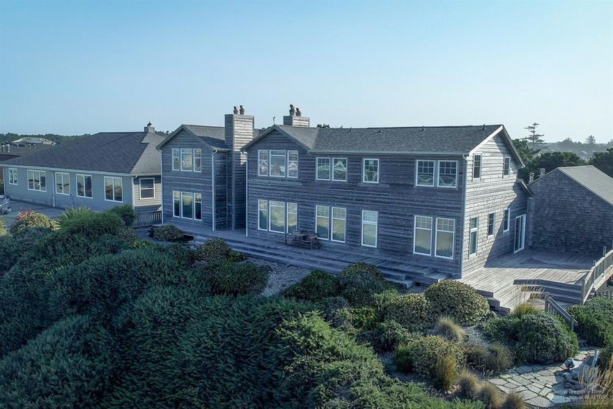 This Cape Cod ocean front estate is in a class of its own. Perched directly overlooking miles of sandy coastline and unobstructed views of famous Face Rock beach. Possibilities for this turnkey home include personal, vacation, corporate, or golf retreat at nearby world-famous Bandon Dunes Resort. Spacious home features 3 oversized private master suites w/ stone fireplaces, 5 bed & 4.5 bath, home office, plus ample indoor/outdoor entertaining spaces on one of Southern Oregon's most sought-after locations.