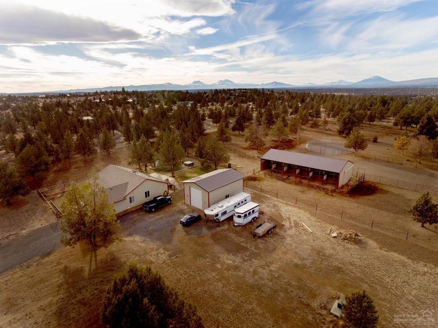 Bring your Horses and Hobbies! This clean property is fenced and groomed with a 36x 72, 7 Noble stahl barn (which could easily be converted to a large shop)! With heated water and noble feeders, heated 12x24 tack room, plumbed for hot water too! 16 tons of hay storage in the barn! 70x120 sanded arena and 60-70' sanded round pen. Separate 864 sq ft shop with 14' roll top door. The home offers new exterior paint and updates through out the kitchen and baths. Stainless Steele appliances, plus new vinyl wood flooring and carpeting !!