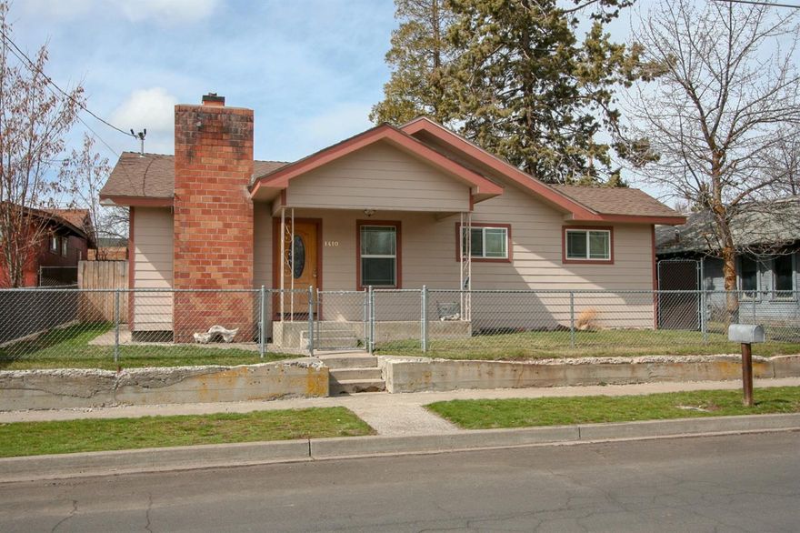 Great property with a detached shop area that could be turned into a garage, fully fenced yard and curb appeal. This clean and tidy 2 bedroom and 1 bath home has an updated kitchen, fireplace, tile and laminate flooring, and a cute backyard. Such a charming home. Close to OIT, the hospital, parks and downtown. Basement has additional storage.