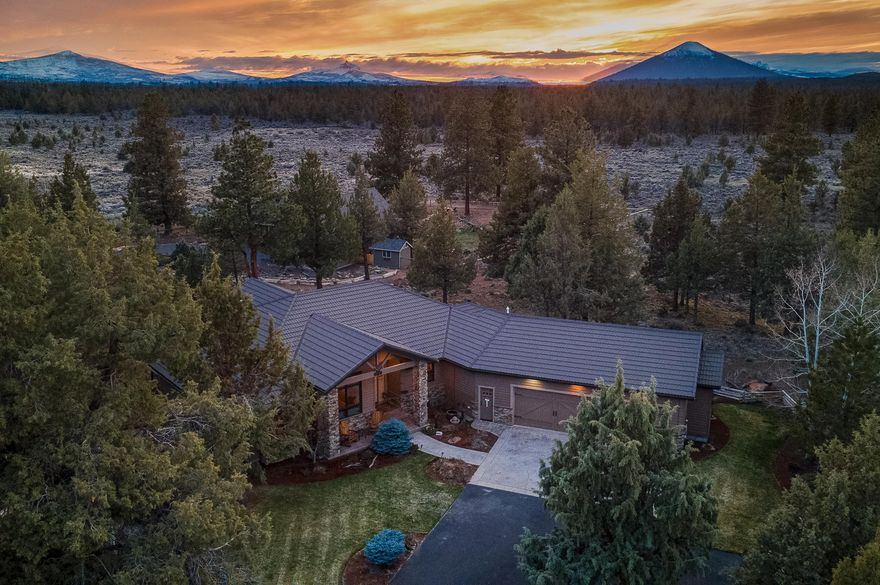 Live on 2.5 acres at the gateway to the Cascades in Squaw Creek Canyon Estates, a beautiful tight-knit neighborhood with sweeping mountain views. Designed to inspire, this gorgeous 2,913 ft² home has been built to last the ages. Tour of Homes award-winning single-level floorplan boasts 3 master EnSuites, office, half bath, and luxurious living spaces which will exceed your expectations of class and comfort.  Of course, no fortress would be complete without an oversized, fully finished, and heated 3-car garage.

Schedule a viewing to see more features, boasting:

 - GARARD stone coated steel roof
 - Large windows commanding natural light complete with peek-a-boo views
 - Covered concrete porch
 - Tray and 12' open beam ceilings
 - Enormous walk in closet
 - Viking appliance package
 - Fireplace in great room and primary bedroom
 - New Trex decking with iron rail and copper post caps.  --Ask for an inclusive features sheet for to know more about this beautiful home!