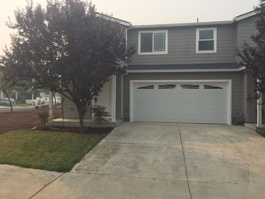 Move in Ready - Three Bedroom / Two and one half baths in 1694 square foot town home with Two car Garage. The home is freshly painted inside with Neew Carpets, Granite Counter Tops, Gas Forced Air Heat / Central Air. Private Rear Yard with a Gate to the Private Park Area for Residents of this Area. .