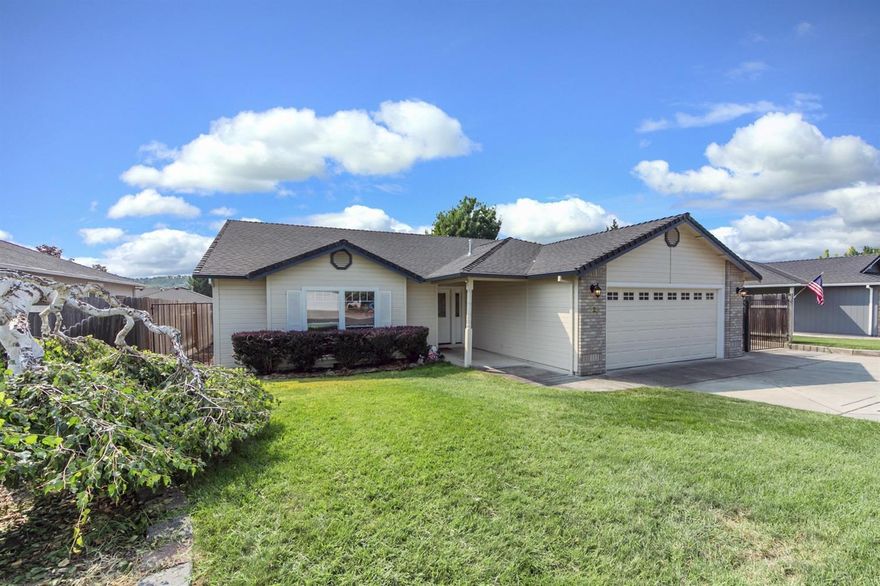 We welcome you to come & tour this beautifully cared for 2000 built home! Located in a lovely, quiet neighborhood in Eagle Point. This 3 bedroom, 2 full bath home features several upgrades. These include, but not limited to, bathrooms with leathered granite counters, tile backed showers, & heated floors, laminate through the living, dining, & kitchen areas, a soaking pool in a beautifully manicured backyard, & a full concrete side yard, ideal for parking an RV or any other vehicles. Come see this wonderful home before it's gone!