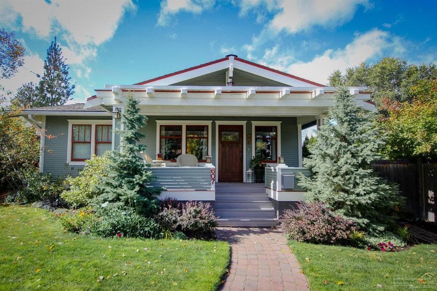 Beautifully restored home in the heart of town! A perfect blend of the character from 1916 with modern day functionality. Some features include wood framed windows, built-ins, custom lighting throughout, wood trim detailing, updated kitchen with 2 ovens and lots of storage. Exterior features include a 2 car garage, parking pad for a car or camper trailer, beautiful landscaping and a cozy private back patio. Truly turn key!