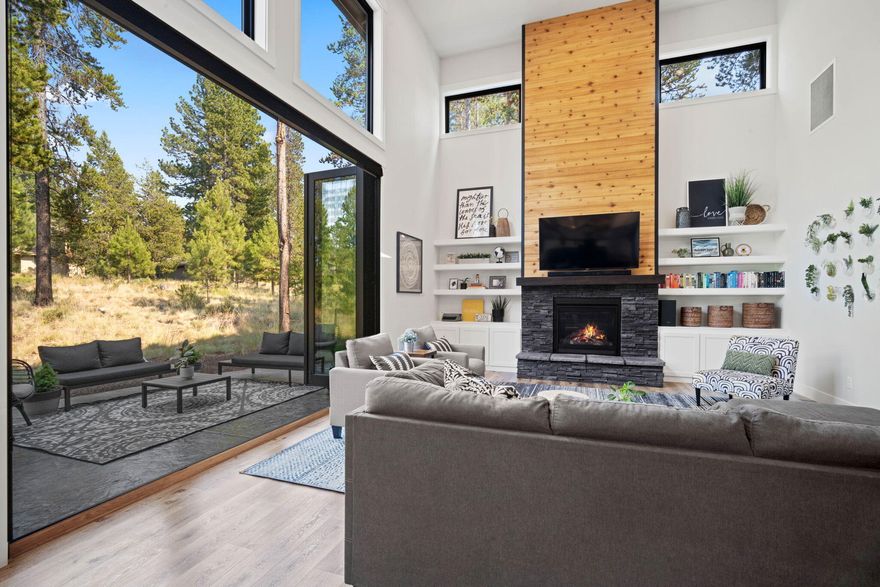 This gorgeous 2017 custom built home in Sunriver is truly unique, and totals 3,540 sq ft of living space. The great room features indoor/outdoor living with a 10ft X 12ft door that completely opens to the beautiful stamped concrete patio. The open-concept floor plan is illuminated by natural light beaming in through expansive windows that highlight the high ceilings. The home has 4 bedrooms, a bonus room, an office., two full and two half bathrooms. The detached ADU has a kitchenette and full bathroom, and vaulted ceilings. The stunning kitchen is quipped with quartz and granite countertops. The large island will quickly become a favorite spot for family and friends to gather. The primary suite is a serene retreat with a spa-like ensuite bathroom and private deck. Upstairs peak-a-boo mountain views. Could be a rental, second home, or full time residence. This is a rare find in Sunriver!