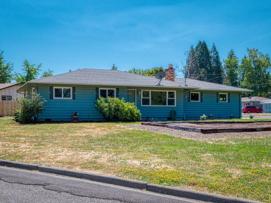 Large corner .32 acre lot, within walking distance to St. Mary's High School. Well kept home, that has been owned by the same family for over 40 years. All 3 bedrooms with hardwood floors, unique textured ceilings and decent size. Living room with large picture windows, brick fireplace, and oak hardwood floors under carpets. Kitchen with wood cabinets, small dining area, and door to back deck. Utility room in enclosed in a section of the garage, RV Parking space, with large front & back yards. Possibility of adding an Additional Dwelling Unit on lot.