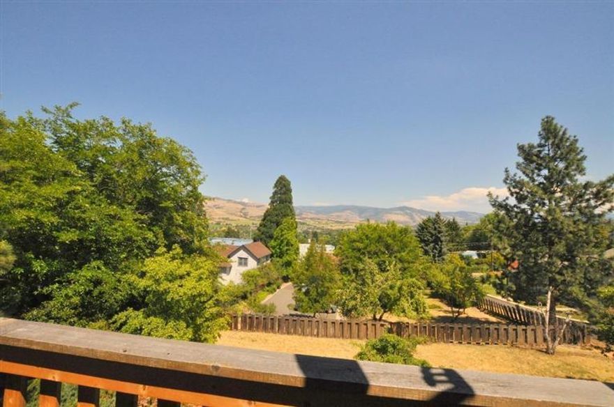 Wonderful duplex with lovely views of the picturesque, rolling Ashland hills. Ideally located on the upper slope of North Ashland, just blocks from downtown and the hospital. This well-kept property offers decks off each unit, featuring that beautiful view, privacy from neighbors, individual outdoor space and long-term tenants that would love to stay. Each unit is 2 bedroom, 1 bath and has a single car garage. Strong possibilities for further development of the property, if desired. Buyer to do their own due diligence.