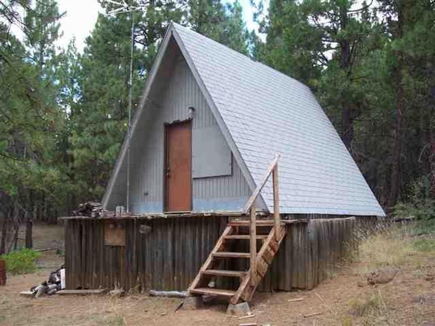 2.31 Acre Parcel With A 16x16 Shed/Cabin. Water Storage Tank And Pump Stay With Sale. Also, 6300 Watt Generator Goes With Sale. Trailer Does Not Stay,