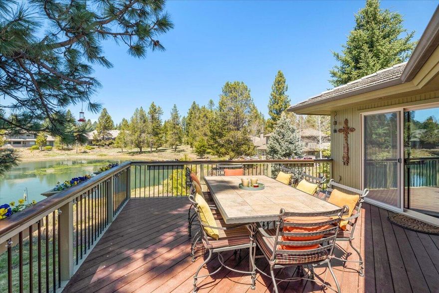 Boasting unparalleled pond views & serene backdrop of the 8th Fairway on Woodlands GC! Luxurious custom Sun Forest built home nestled on an oversized 0.40-acre lot in Sunriver Resort. Ascend to the main living area & gourmet kitchen adorned with granite counters, an induction stove, stainless appliances and expansive island—a chef's delight indeed. The main primary suite upstairs is complemented by convenient guest bdrm w/ full bath just steps away. Discover 2 additional Jr suites downstairs, alongside a spacious family room & covered patio area offering picturesque views of the wildlife. Upgrades abound, from the tile roof to the paver entry & 3-car heated garage w/ workshop area. New furnace w/ zone heating & hot water heater installed in 2023.  Additional amenities include a wine cellar, dumb waiter, A/C, hot tub, expansive decks, & custom landscaping. Set on a street of high-end homes.  Welcome to your luxurious new Sunriver Home!