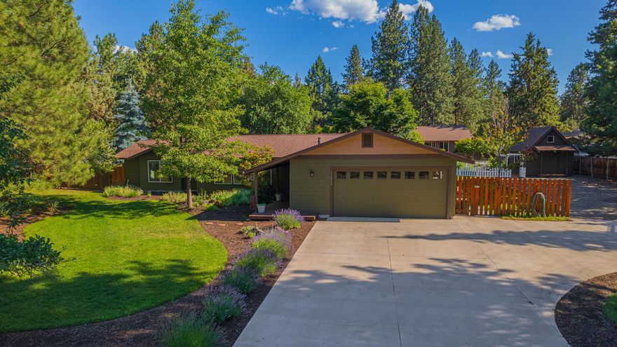 Welcome to your own private oasis in SE Bend! Situated on a .46 acre lot, this one level homes checks so many boxes including spacious RV parking w/ gated access, custom shed w/ power + loft ready for your ideas, large new Trex deck, fenced garden w/ raised beds, chicken coop, greenhouse, massive yard w/ .25 acres of irrigation rights, + so much more. Looking for multigenerational living or ADU potential? How about both! The home consists of 3 bedrooms, 2 baths, living/dining/kitchen/laundry & attached oversized 2-car garage as well as an attached space complete w/ living area, private entrance, full bath, + 2 additional rooms perfect for ADU conversion or in-law quarters. Several other upgrades have already been done including reverse osmosis water filtration, solid surface counters in kitchen, new appliances, tankless water heater, w/ opportunity to add your own personal touches as well. You don't want to miss your shot at this rare find in a quiet & convenient SE Bend location.