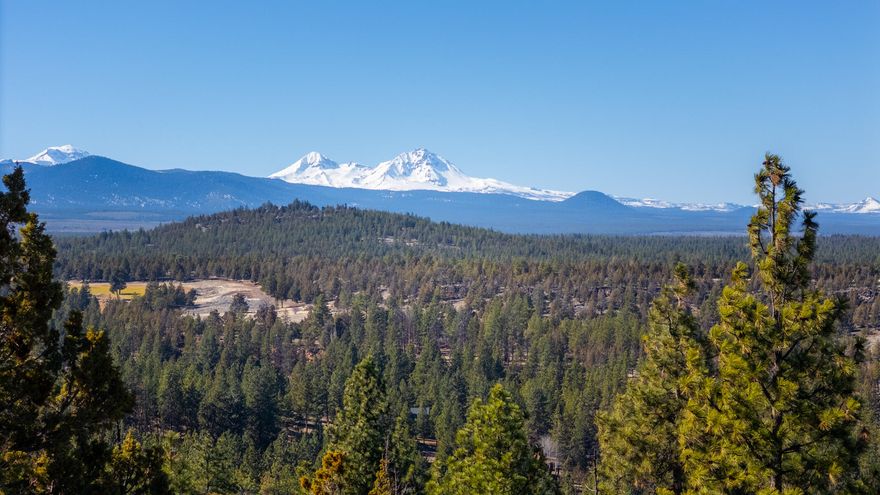 Bring your vision to life in the esteemed North Rim community of Bend, Oregon. This expansive 1-acre lot presents a rare opportunity to design a custom residence with sweeping Cascade Mountain views. Nestled in a gated neighborhood celebrated for its tranquility and natural beauty, North Rim blends seclusion with a sense of community. Residents enjoy exclusive amenities, including tennis and pickleball courts, scenic walking trails, a private clubhouse, and direct access to the Deschutes River Trail. Perched atop Awbrey Butte on Bend's NW side, this premier lot offers the perfect backdrop to embrace Central Oregon's stunning scenery and elevated lifestyle. Designed to preserve the native landscape, North Rim features rock outcroppings, native vegetation, and architecture that harmonizes with the high desert surroundings—all just minutes from downtown Bend, world-class recreation, dining, and shopping. West-side lots with views like this are scarce—act now before it's gone!