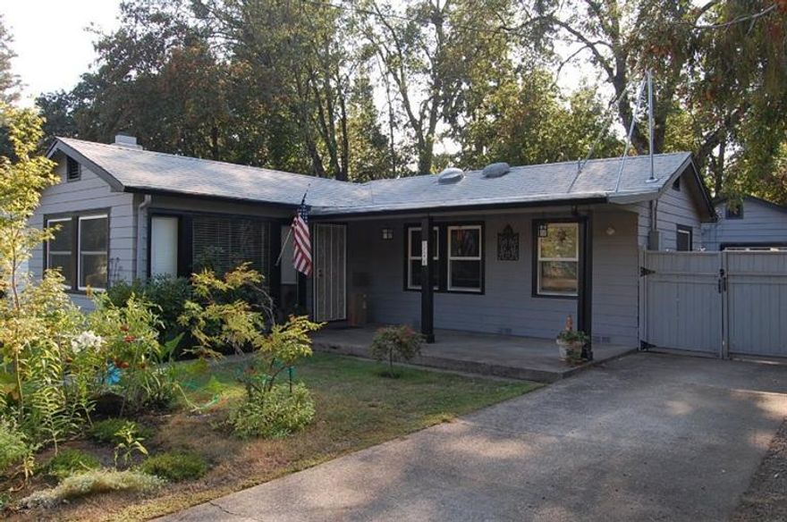 The main home has 810sf with 2 bedrooms, 1 does not have a closet, 1 bath, newer heat pump system, most windows are double paned windows, back yard is fenced for privacy and the home is as cute as can be. The back home is a 320sf studio apartment with 1 bath, wall heater, no a/c. Located on .15 acre lot. The main home is currently rented and rents for $950/month, the studio was renting for $475. Zoned R-1-6, seller was told the studio was grandfathered-in when she purchased the property...buyer to do their own due diligence.