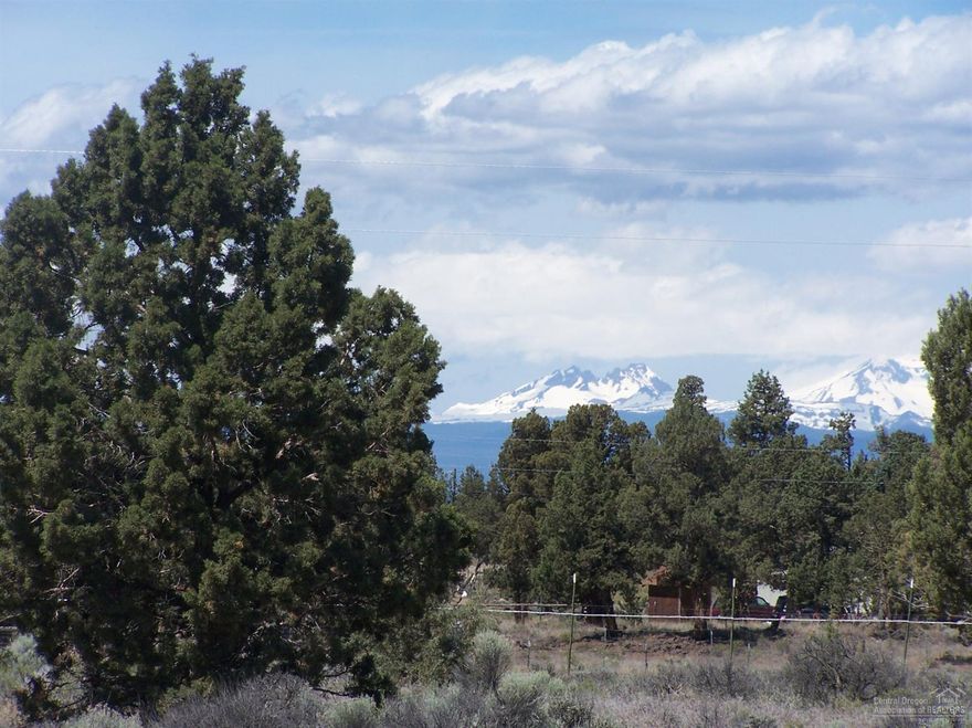 Beautiful Cascade Mountain Views of Mt. Bachelor & The Three Sisters from this inviting 4.67 treed acre property eagerly awaiting your dream home! Property is fenced on two sides and the road is paved to the corner of Bachelor and Deschutes Road. peaceful and quiet area only 12 minutes to Costco and close to all the world class recreation Central Oregon is famous for! Don't miss this opportunity. Your dream starts right here. Owner is not able to carry the contract.