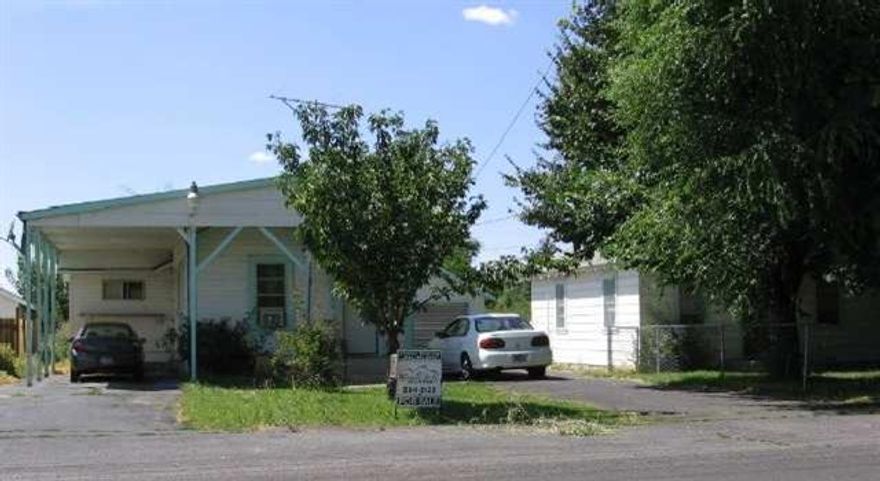 Investment Property. Two Homes On One Tax Lot. Good Sized Lot. Could Be A Great Fixer For A Profit!!! Both Have Their Own Driveway, But Can Share Two Car Garage With Storage Behind.