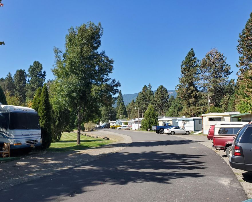 Mountain Village Mobile Home & RV Park, located at the gateway to the beautiful Cascade Mountains, and Crater Lake National Park. True pride of ownership and management comes with this exceptional multi-use property, that includes a 26 space mobile home park, 7 RV sites, a small cottage, plus a fully occupied 24 unit mini storage facility with vehicle storage, and a commercial building that houses a 7 washer-4 dryer commercial laundromat, 2 office locations, and a small leased commercial building. All this located on 8.5 acres of pristine park-like grounds. Recent improvements include a caretakers residence, repaving parking and driving surfaces, and three new mobiles.