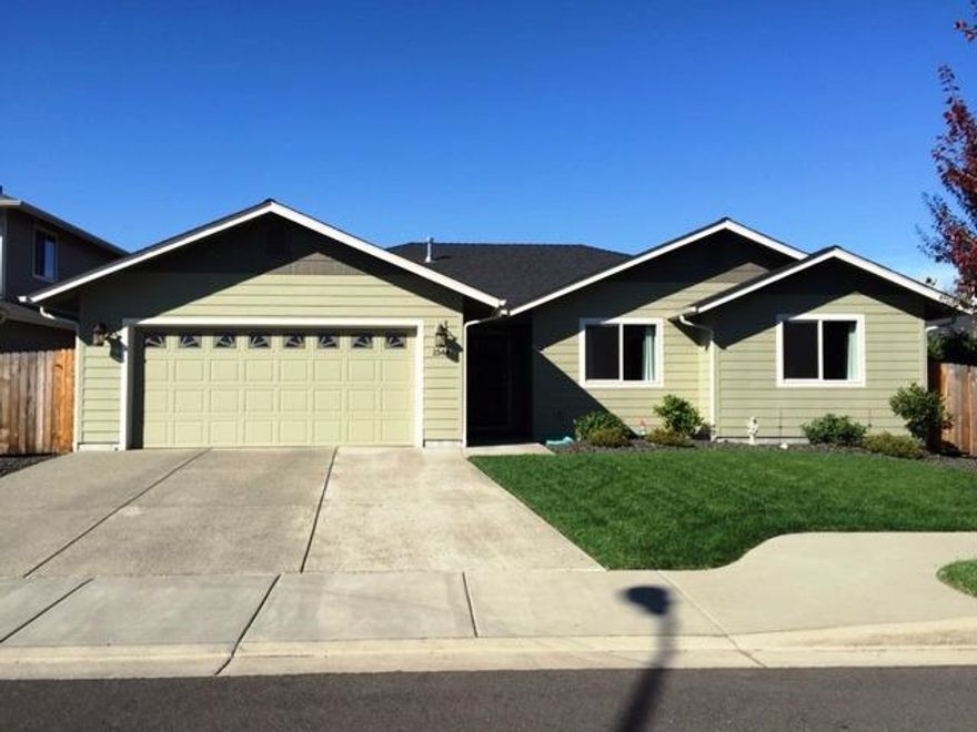 Better Than New! Here's a gorgeous Kirk Chapman home built in 2013. Features 3 bedrooms, 2 baths, and approx. 1513 sf, living room has vaulted ceilings, dream kitchen has slab granite counters, wood cabinets, pantry, stainless steel appliances that include; refrigerator, dishwasher, microwave, range oven, and washer and dryer are included. Master bath has double sinks and slab granite counters, hall bath has slab granite counters and tub/shower, master bedroom has coffered ceiling and walk in closet, dining room with slider to small covered patio, the property is fenced and fully landscaped. Turn key with all the window coverings make it better than new.