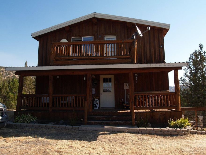 Charming & Rustic describes this nice Ochoco West home that sits high atop Circle Street. Super easterly mountain & terrain views! Approx 1900 SF of living space. 3 bedrooms, 2.5 baths, accented with large log beams, wood floors & doors & 2 decks. Also included is adjoining 9200 SF separate lot! Ochoco West amenities include community pool.