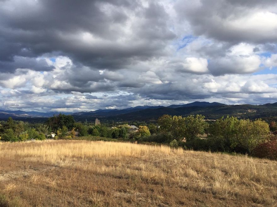 Beautiful 5-acre lot with a remarkable amount of potential. Only minutes away from historical Jacksonville. The artesian well has recently been drilled bringing in 15 GPM. This lot has amazing views of the valley and Mt. McLoughlin.
