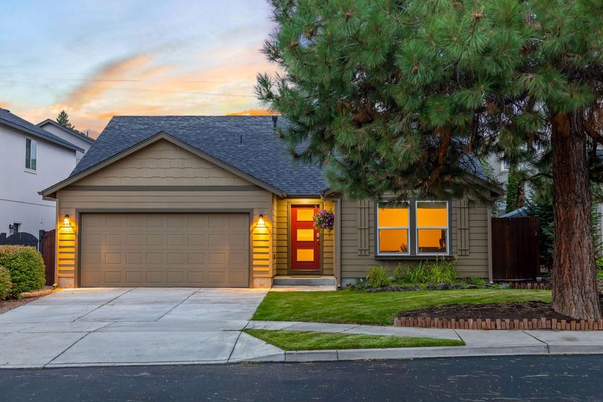 Framed by a lush lawn, mature pine tree and thoughtful landscaping, this inviting single story home welcomes you inside where vaulted ceilings, a cozy gas fireplace and brand new A/C set the stage for your year round comfort. The roomy primary suite offers two walk-in closets, dual sinks and has smart separation from the other two bedrooms.

The kitchen is the heart of this home with generous counters, a pantry and custom island designed for functionality and with gatherings in mind. The open layout creates a seamless connection between the kitchen, great room and eating area which flows out to the enclosed patio, which comfortably extends your living space. Ideal for enjoying the lovely fenced backyard and your morning coffee, sunny afternoons, peaceful evenings or however you desire!    

A laundry room and two car garage completes the home, complemented by a friendly neighborhood just 1.5 miles from the Old Mill District and close to parks, trails, shops, and amenities.