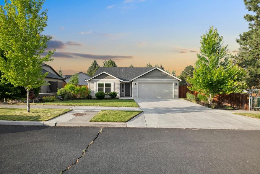 Tranquility at the end of a quiet dead-end street in SE Bend, this single-level home offers privacy, fantastic neighbors, and 1,419 sq ft of well-designed living space. With 3 bedrooms and 2 full baths, the home features an open, spacious floor plan with brand-new laminate wood flooring.  Zero stairs, a walk in shower and easy care, this home is ideal for low maintenance living.  Set on a fully fenced 0.17-acre corner lot, enjoy outdoor living on the paver patio with the waterwise garden that is landscaped with native plants.  In desirable SE this move-in ready home includes central A/C, an attached two-car garage, and no HOA fees. A rare find in a quiet, convenient location—come see it today!