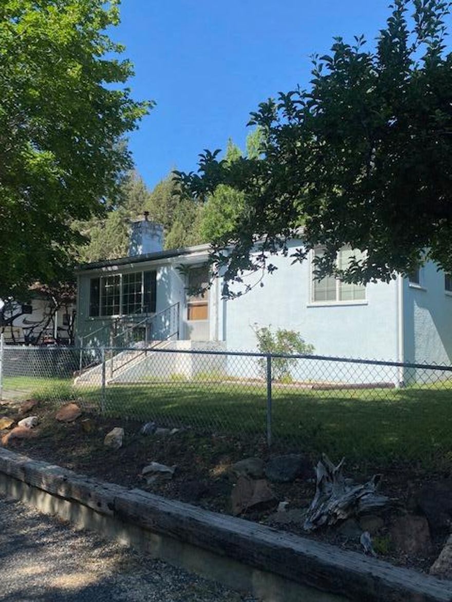 Nice n Tidy Home In Canyon City On Humbolt!
Cute kitchen w/lots of light & tile countertops,  dining room, living room w/pellet stove, 2 bedroom, 1 bath, basement w/bonus room, pantry & laundry, ceiling fans,  linen closet, utility room, vinyl windows, forced air oil furnace, wood, carpet & laminate flooring, composition roof w/gutters,  landscaped, fenced yard, shade trees, plenty of space for your rv and recreational toys, circular graveled driveway, detached garage w/workshop, rock retaining wall, bbq lean too.  $240,000 #1118