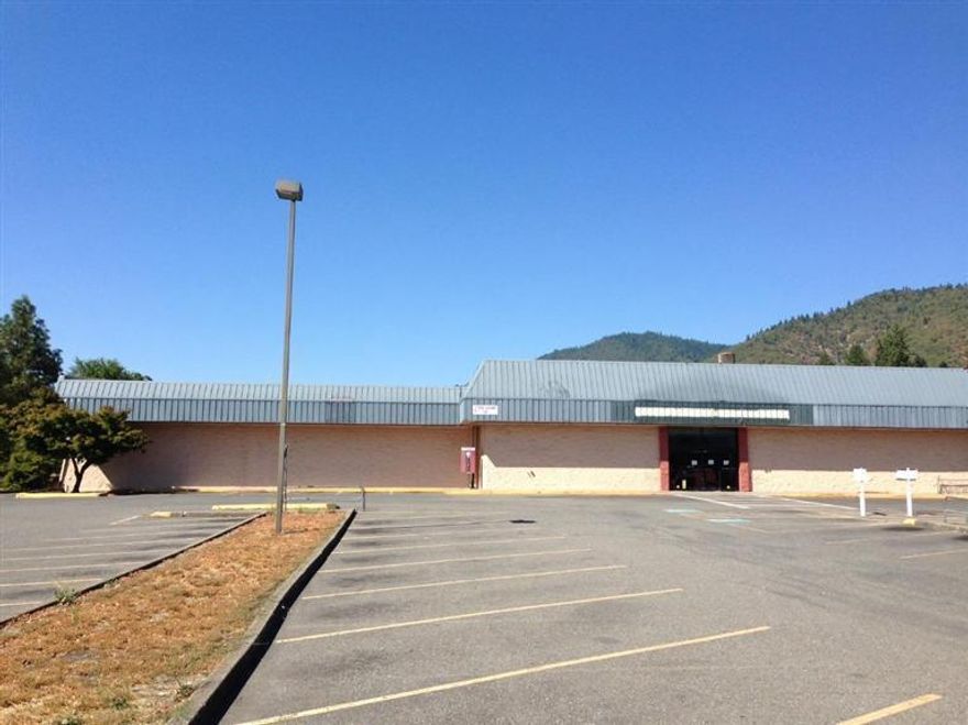 $250,000.00 Price Reduction! High exposure former Ray's Food Place location on 7th Street in Grants Pass, on the North end of town near I-5. Approximately 29,964 square foot building situated on 2.13 acres with 157 parking spaces. Building and property have been extremely well cared for and would be great for a wide variety of commercial uses. Available for sale at $1,999,000 or lease for $18,500/month Triple Net. Contact listing Agent for additional information.