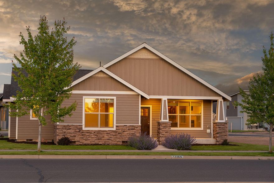 Stylish 2 bed, 2 bath, 1,478 SF Craftsman on a corner lot in Ironhorse. Built in 2017 this home is thoughtfully designed with open floor plan and upscale finishes throughout—luxury plank & carpet flooring, gas FP with granite surround, and a stunning kitchen featuring Quartz counters, tile backsplash, gas range, and rich black walnut custom cabinetry. Spacious primary suite offers a walk-in closet, Quartz double vanity, and shower. Enjoy the covered front porch with handsome stone pillars, large, covered side porch, and paver patio area. Additional perks include a fenced storage area, graveled area for RV/extra parking, alley-load 2-car garage, underground sprinklers and drip system. This home ''Combines quality craftsmanship, spacious living, and everyday comfort in a premier neighborhood setting.''