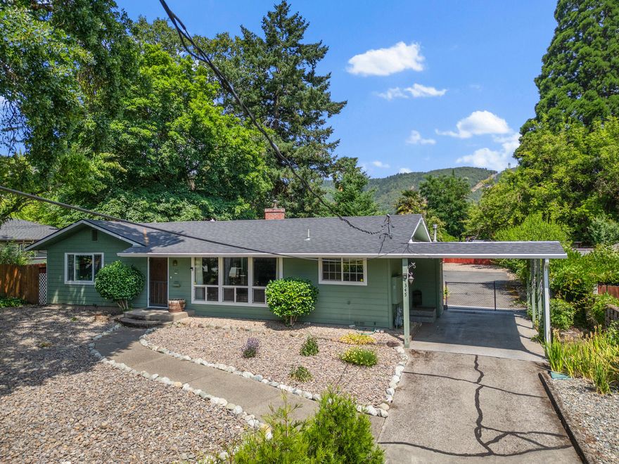 Charming & Well-Priced Home in Sought-After Grants Pass Neighborhood
Welcome to your new sanctuary in beautiful Grants Pass, Oregon! Tucked away in a desirable neighborhood, this lovingly maintained home offers the perfect blend of charm, comfort, & outdoor serenity. Meander onto this enchanting property, complete with a picturesque arbor, a seasonal creek, & a whimsical bridge that adds a touch of magic to the landscape. Inside, you'll find three bedrooms, two updated bathrooms, a spacious living room, & a separate bonus room—perfect for a home office, playroom, or guest space. The beautiful hardwood floors & super-clean interior reflect pride of ownership throughout. Enjoy a large kitchen with a pantry, ideal for home chefs, & step outside to a private covered patio—perfect for relaxing or entertaining. Sitting on nearly 1/3 of an acre, the property features mature, low-maintenance landscaping, offering peace & privacy year-round.
Don't miss the the detached 550 sq. ft. workshop!