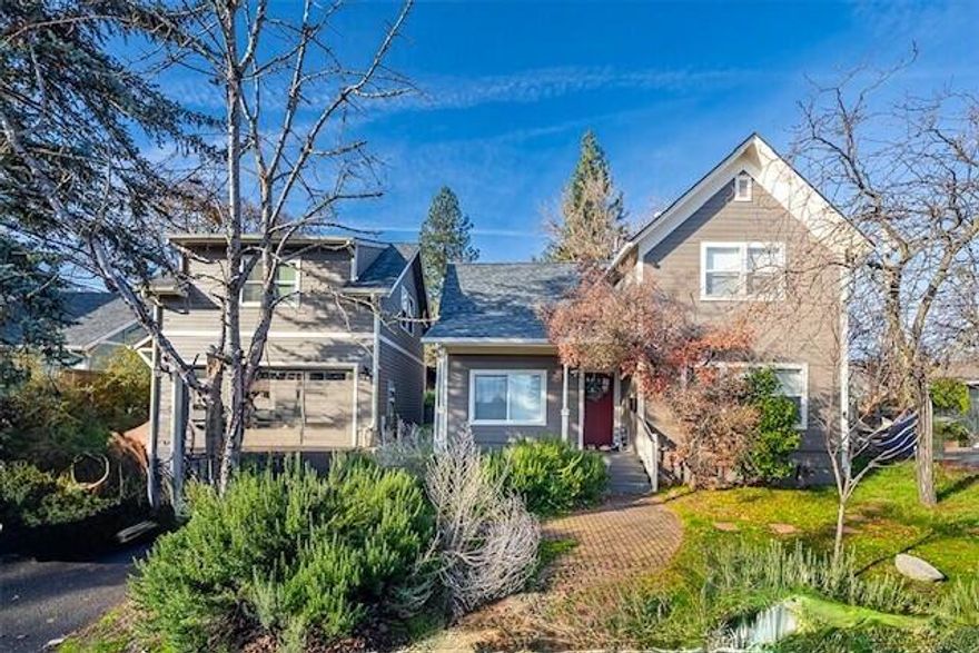 Rare Offering! R2! Three beautifully updated residences on one tax lot, each with its own address and separate meters, plus a large, detached garage. R2 zoning so 2 units could qualify for AirBNB. Located at the corner of Rock and Maple, this charming main home was fully renovated in 2018 and offers a welcoming covered porch, 1,720 sq ft, 4 bedrooms, 2 baths, and an easy layout with living, kitchen, dining, one bedroom, bath, and laundry on the main level, plus three bedrooms and a bath upstairs. The second home is a delightful 2018 single-level 2-bed/2-bath with 1,070 sq ft, an airy contemporary floor plan, high ceilings, clean finishes, and an inviting modern feel. The bright 2018 built studio above the garage is 480 sf and is perfect for guests, work, or rental income. All homes are immaculate with stylish updates, modern systems, off-street parking, and a prime location near downtown. A rare and flexible opportunity for income, multigenerational living, or a private compound.