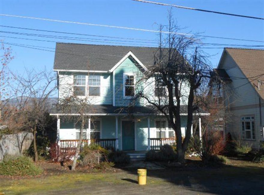 This fabulous two story home is close to shopping, restaurants and the theater. There is a craftsman style front porch, soaring ceiling and slate entry, living room, formal dining room, kitchen nook and family room. Nice pantry and washer dryer hookups inside. The master suite has a large tub, separate shower, double sinks, walk in closet and privacy commode. The detached 2 car garage has a 590 Sq. Ft., 1 bed, 1 bath apartment above. Washer/dryer hookups for the apartment in the finished garage. Alley access with add'l parking and rv parking. Easy care yard with drip sprinklers. Microwave in large house only - not appt. Apartment rents for $625, house normally rents for $1250.00.