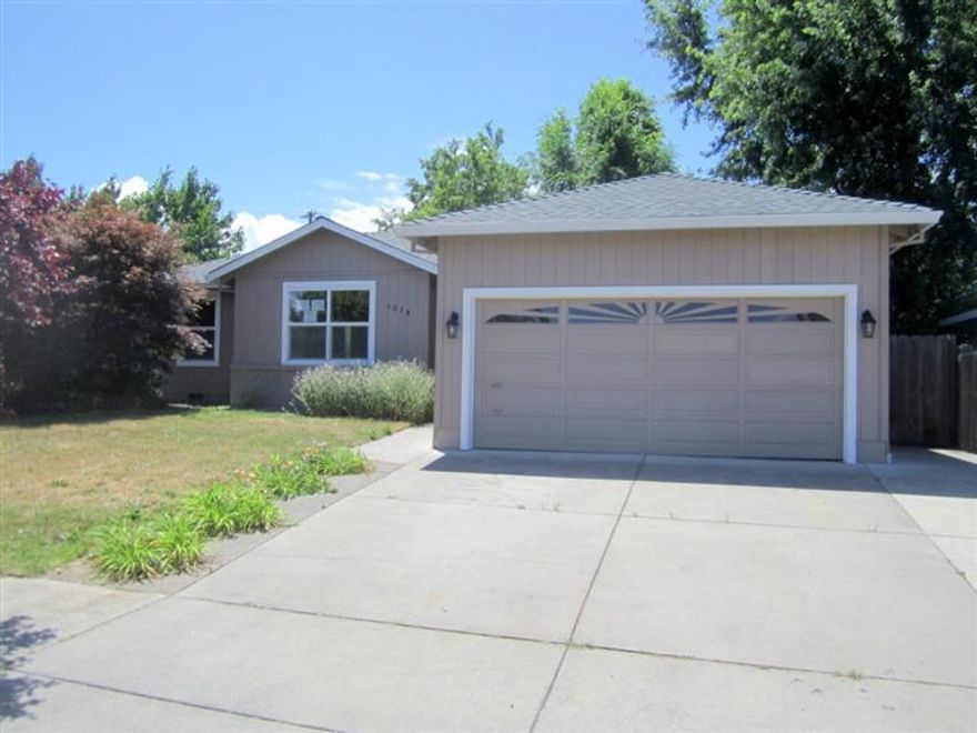 Awesome Ashland home close to Garfiled Park and bike path. Large, open kitchen has tile flooring. gas range/oven, granite counters, pantry cabinets and room for breakfast table. French doors lead to sun room/dining area with tile flooring and large slider to back patio. Attractive bamboo flooring in vaulted living room. Fannie Mae HomePath Property - purchase for as little as 3% down! Approved for HomePath & HomePath Renovation Financing. Close by October 31st and receive up to 3.5% in closing costs assistance.
