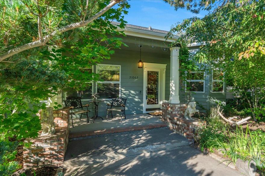 Exceptional home offering timeless style, functionality, and serene surroundings in a highly sought after neighborhood in SE Bend. Thoughtful craftsmanship is evident throughout, from the wood and leaded glass windows, solid maple hardwood floors, 9 foot and cathedral ceilings that bring in character into every space, a gas fireplace with slate and oak hearth and hammered copper surround to the custom cabinetry and granite countertops in the spacious kitchen. A primary suite which offers a peaceful retreat, additional bonus spaces add flexibility for a home office, media room, or guest retreat. Enjoy the beautifully landscaped yard with mature trees, lush greenery, amazing water feature and a sense of privacy rarely found this close to town. The oversized 3-car garage features double-deep bays, golf cart parking, and shop space—perfect for hobbyists or those in need of extra storage. With its prime location and all the incredible custom features, this home is truly one of a kind.