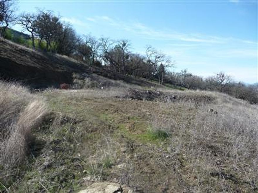 Are you ready to build a custom home? These incredible mountain and valley views await your custom home in Graegle Estates above the Rogue Valley. Now is the time to buy this lot at an incredible price, below market value. Utilities are at the street and the pad is cut on this bank owned lot. Call a listing agent today!