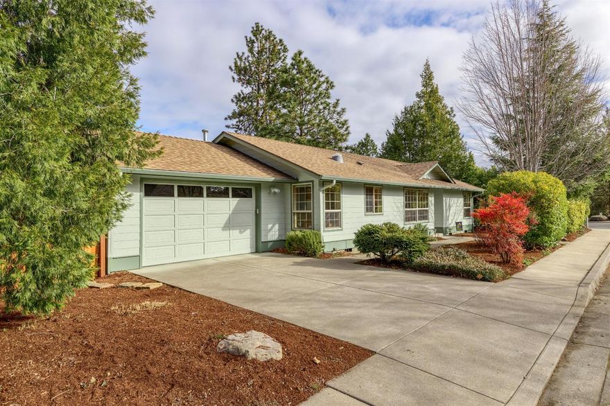 Single level, light and bright and wonderfully cared for home. This open floor plan home has terrific flow with three bedrooms and two bathrooms. The updated kitchen has Silestone countertops, tile floor and newer stainless steel appliances. The spacious and open living/dining area has beautiful wood floors that enhance the open flow and is lovely for entertaining. The kitchen and living spaces are filled with natural light (solar tubes), creating an open feel that belies the size of the home. The master bedroom has an en suite bath and a walk-in closet. The other two bedrooms are away from the master, creating a nice separation of space. The backyard has a sweet deck that is perfect for outdoor dining as well as a raised garden bed. The landscaping has been professionally done and is designed to be low maintenance. This lovely home sits in a terrific neighborhood with mature trees lining the streets. It is also a short jaunt to shopping, the YMCA and the bike path.