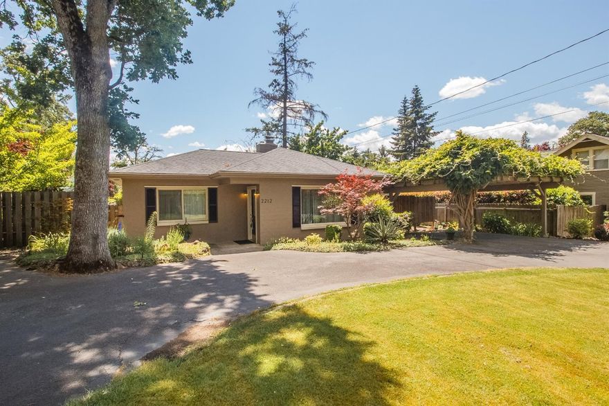 Experience all of the charm and privacy of Old East Medford, while you are just minutes from schools and shopping. Light and bright inside, with skylights and a wonderful backyard that's been professionally landscaped, this home gives you a place to relax on the patio during the Summer. The large master suite has an entrance to the patio. There's a living room with beamed ceilings and additional family room off of the kitchen. There are two more bedrooms, bath and entrance reading nook which would be perfect for teenagers, guests or little kids. Upgrades include new roof, windows, floors, and updated living space. Be sure to check out the light, bright home office in the back building, it is located inside the building which has a slider door, and shop/storage space to the left. A must tour!