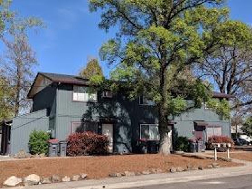 Great Triplex in the heart of Central Point close to shops, food, bus lines and restaurants. Each unit has a large living rom and kitchen on themain floor. Upstairs you will find a bathroom and two large bedrooms. Each units have washer/dryer hook ups. There is abundant parking and each apartment has a storage unit. Great area and investment.