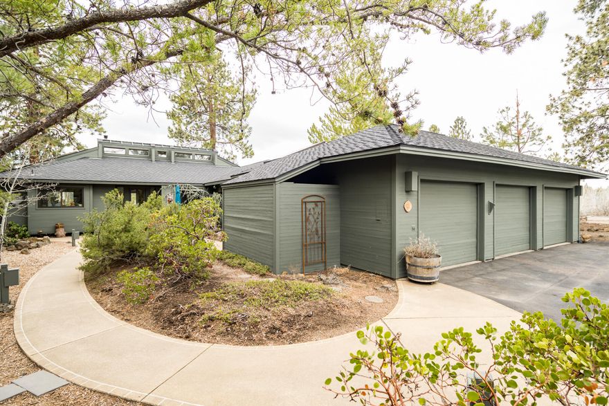 This incredible property is your ticket to the Bend outdoor recreation lifestyle! Sunrise Village is a premier gated neighborhood with private Deschutes River access, paved trails, pool, spa, clubhouse, tennis courts and RV storage, and is just a short bike ride to miles of famous mountain biking trails. Nestled perfectly on a large, private lot, this one-of-a-kind light and bright home has clear cedar tongue & groove walls and vaulted ceilings, and large windows to take in the beautiful views of the Sisters and Mt. Bachelor. The recently remodeled kitchen features custom cabinetry, quartz counters with tile backsplash, copper shelving and higher end stainless steel appliances. A natural gas fireplace and woodstove keep the home cozy in the colder months. The exterior boasts front and rear decks, paver patio with privacy fencing, and a lawn, while the 3-car garage has room for all your toys. On the road to Mt. Bachelor and the Cascade Lakes, this location could not be more perfect!