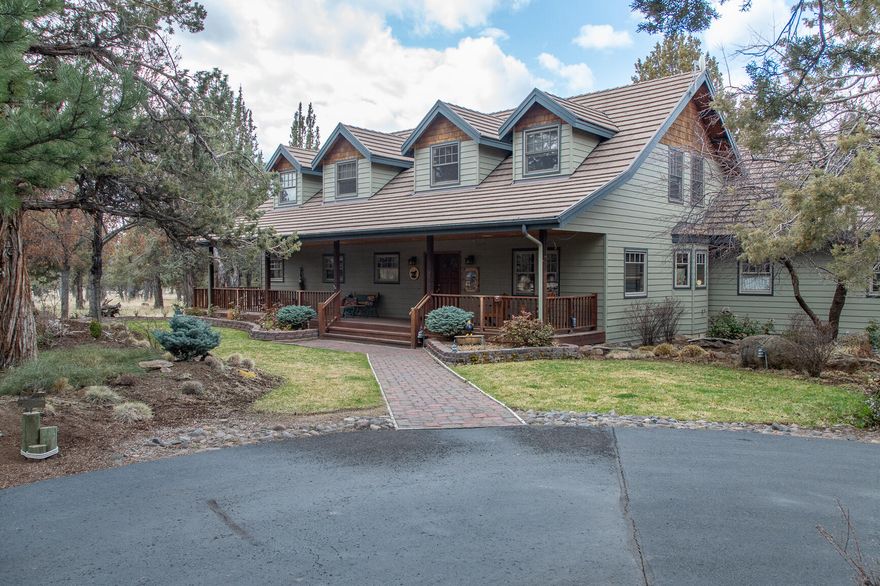 Breathtaking, unobstructed Cascade Mtn views from this Sisters, OR family farmhouse situated on private 5.32 arces. Paved driveway leads to a 1,926' shop w/RV door and 900' 2-stall horse barn.  This 3,416' house 3/BR with bonus or 4th BR and 3.5 BA. Office off entry.  Soaring river rock wood burning fireplace.  Vaulted tongue & groove Pine celings in greatroom, dining room & primary BR.  Professionally landscaped with water features front & back.  Backyard pergola for outdoor dining & entertaining.  Just  5 miles to DT Sisters!
