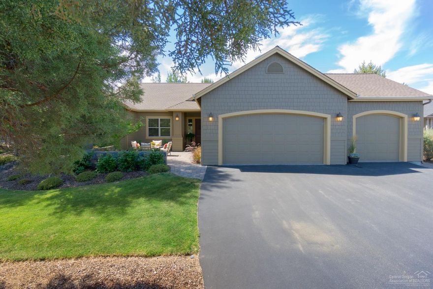 Gorgeous one level home in The Falls at Eagle Crest Resort! Great room plan with den boasts luxury finishes and upgrades throughout. Hickory, tile and slate floors, slab granite in kitchen and tile accents in baths. Master suite with soaking tub, separate shower, and walk-in closet. Spacious guest suite with vaulted ceiling. Expansive paver courtyard and patio. Private backyard retreat with beautiful low maintenance landscape. Triple car garage with custom built-in storage. New siding and exterior paint.