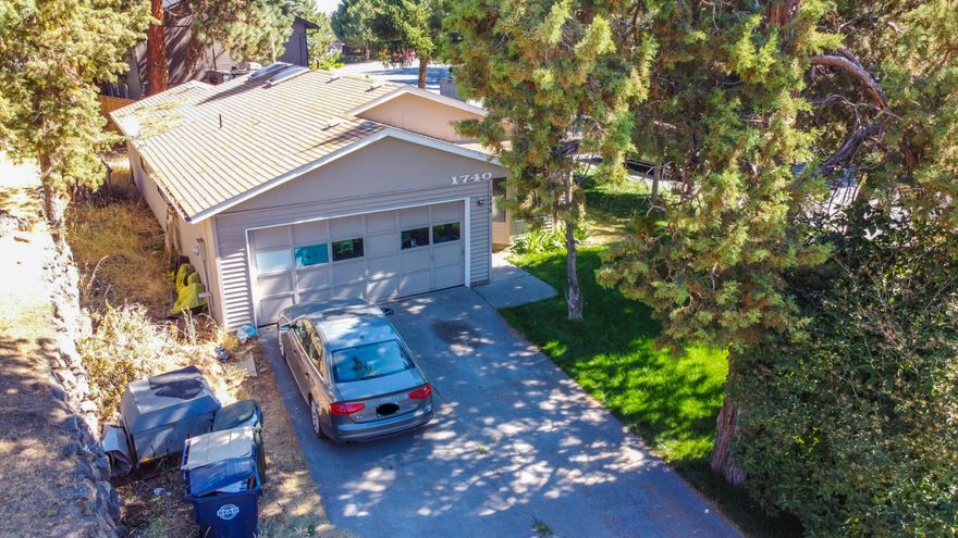 Wonderful starter home on sizeable corner lot in quiet NE Bend location! Well-appointed layout with 3 bedrooms, 2 bathrooms and a full 2-car garage. Enjoy the outdoor space and ample shade provided by numerous mature trees. Convenient location close to schools and shopping. Attention investors and flippers: Great opportunity to keep as income-producing or update and re-sell!